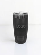 A matte black insulated travel tumbler with a clear plastic lid, featuring the word 'LOGO' printed on the front, set against a plain white background.