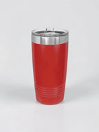 A red insulated travel tumbler with a stainless steel rim and a clear plastic lid, shown on a light gray background.